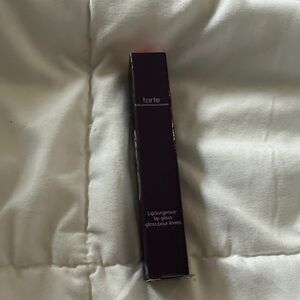 tarte LipSurgence Lip Gloss in Deep Plum Packaging